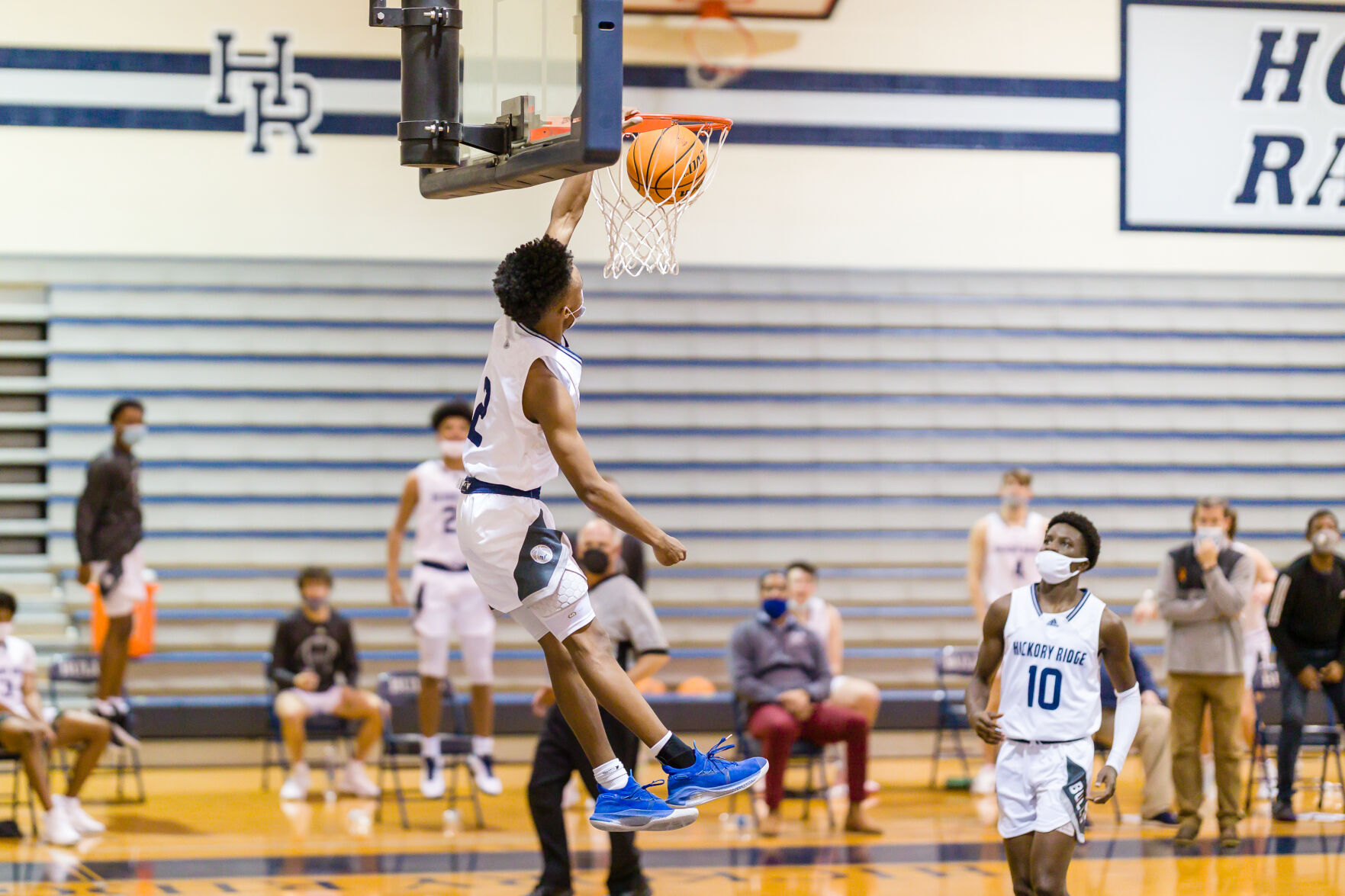 Boys Basketball: Hickory Ridge RaginÕ Bulls defeated the Northwest Cabarrus Trojans 64-56.